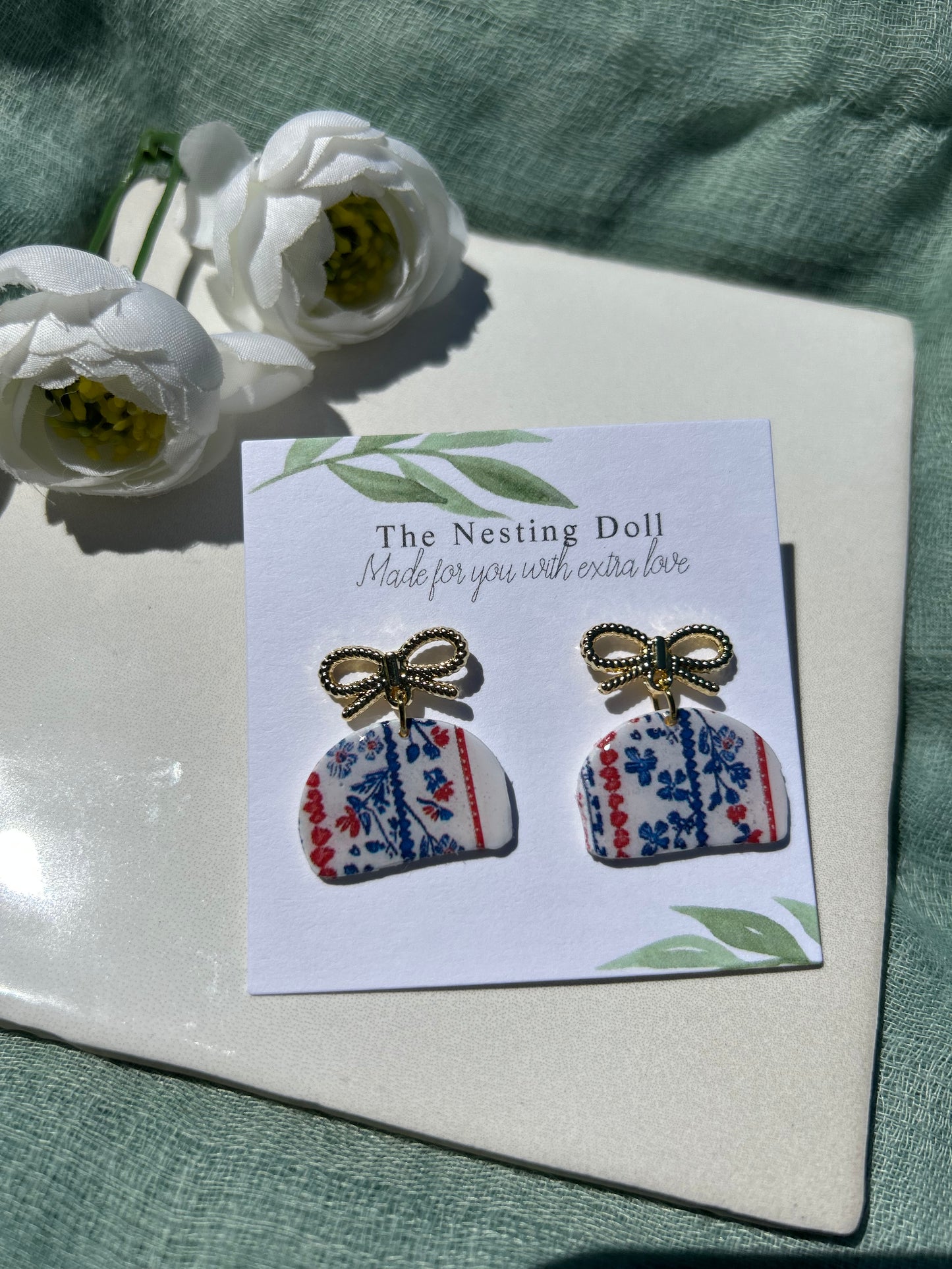 Gold Bow Clam Shaped Floral Dangles