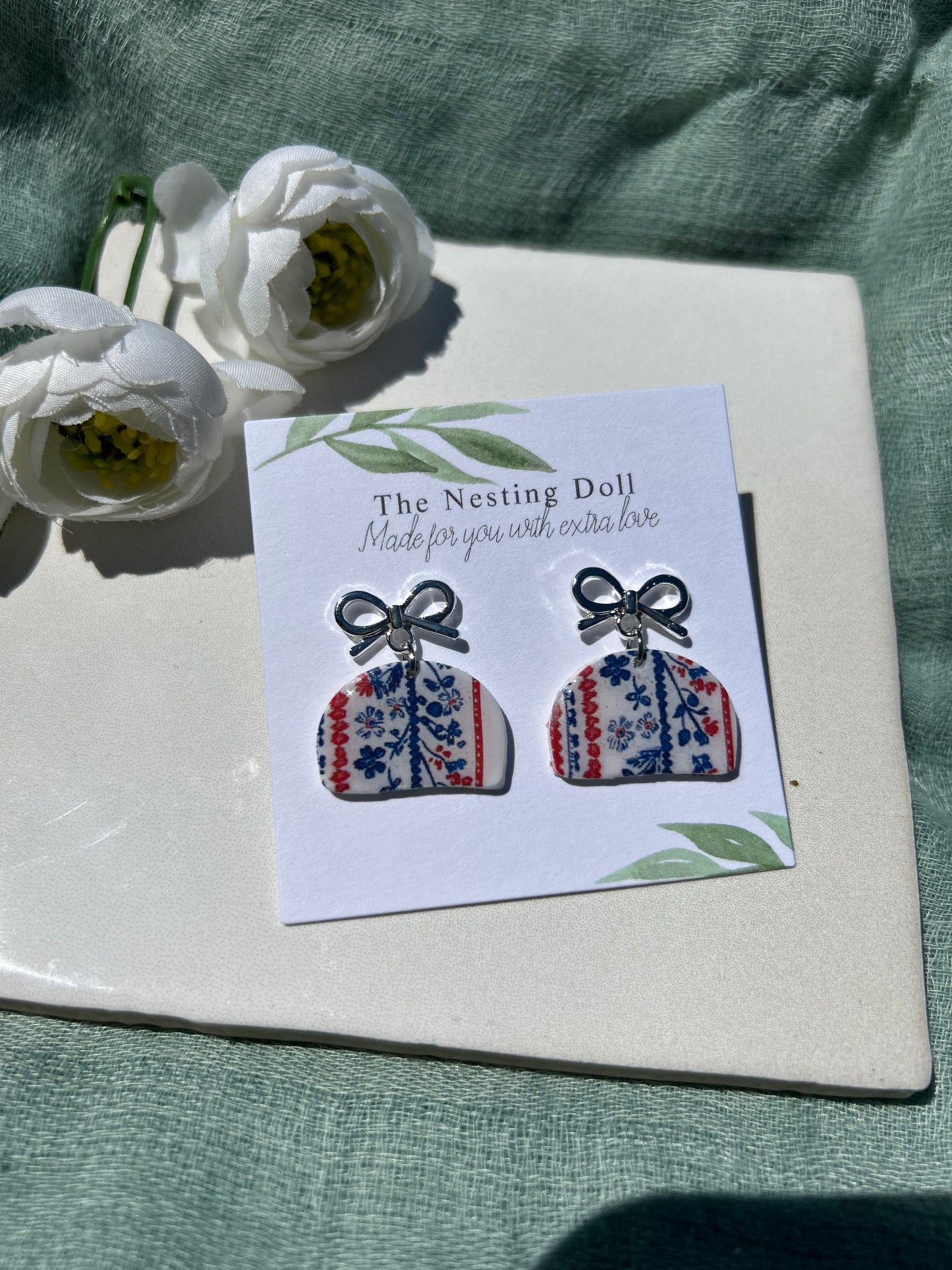 Silver Bow Clam Shaped Floral Dangles